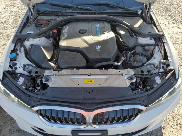Photo 11 from auction – 2024 BMW 330E with VIN 3MW39FF09R8D93607