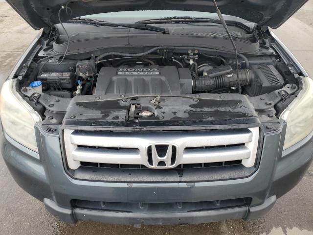 Photo 12 from auction – 2006 HONDA PILOT EX with VIN 2HKYF18596H504694