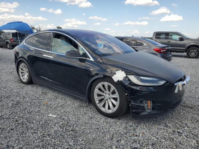 Photo 4 from auction – 2017 TESLA MODEL X with VIN 5YJXCBE2XHF060912