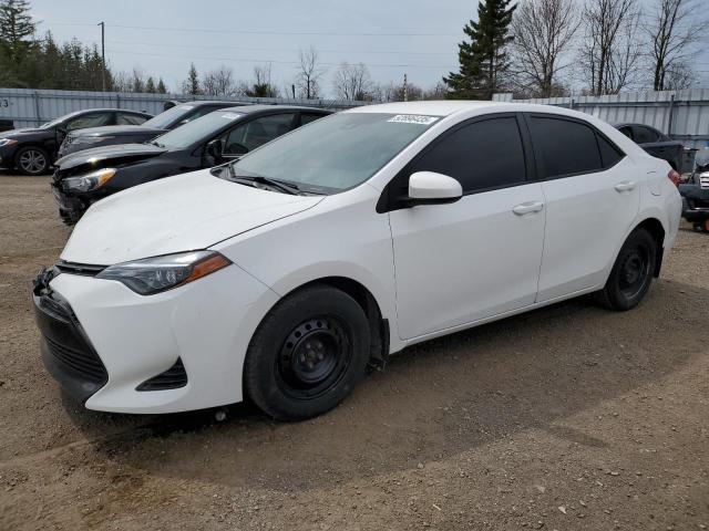 TOYOTA COROLLA L 2019 with VIN 2T1BURHE9KC142812 - Photo from auction