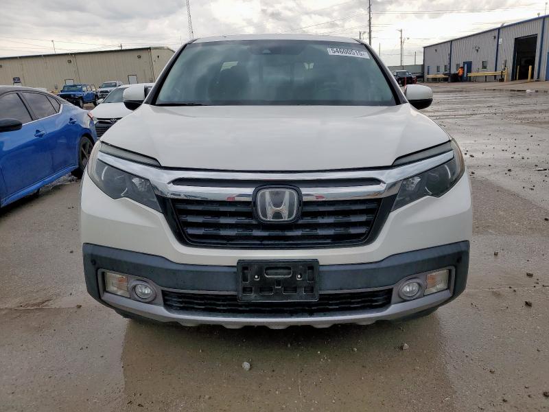 Photo 5 from auction – 2019 HONDA RIDGELINE with VIN 5FPYK3F72KB005666
