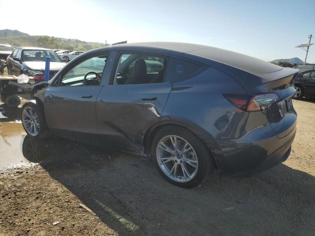Снимка 2 от търг – 2023 TESLA MODEL Y с VIN 7SAYGDEE7PF851625