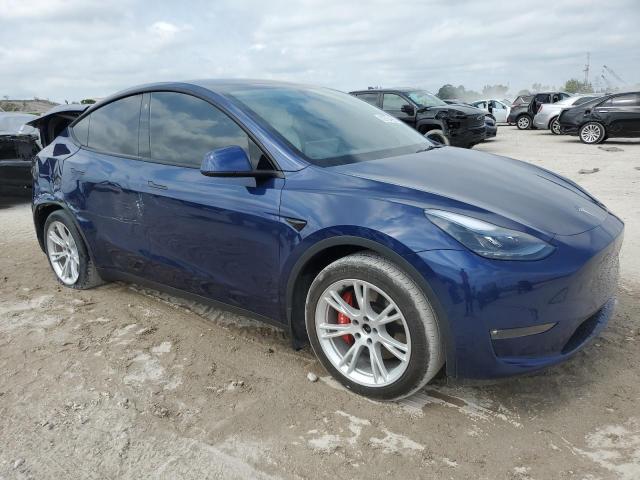 Photo 4 from auction – 2022 TESLA MODEL Y with VIN 7SAYGDEE2NF395904
