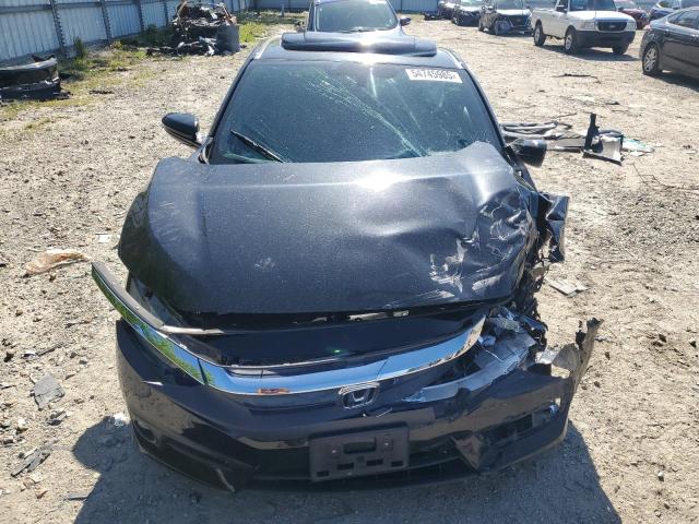 Photo 5 from auction – 2016 HONDA CIVIC LX with VIN 2HGFC4B06GH305502
