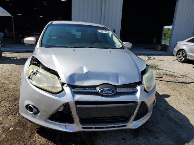 Photo 5 from auction – 2012 FORD FOCUS SE with VIN 1FAHP3K20CL413687