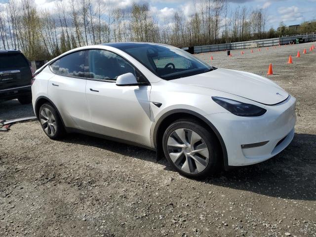 Снимка 4 от търг – 2023 TESLA MODEL Y с VIN 7SAYGDEE3PF966948