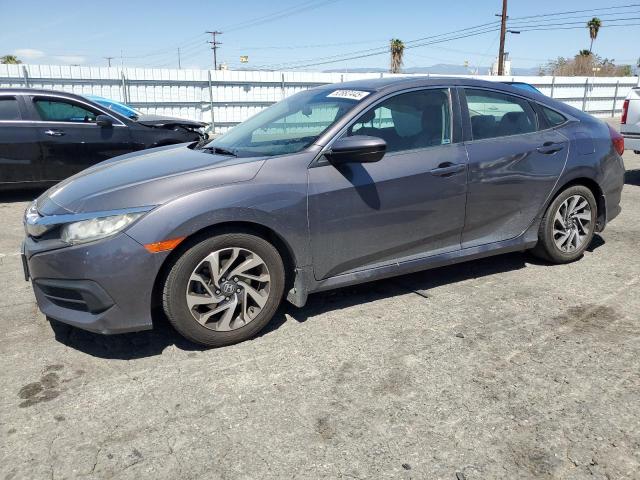 HONDA CIVIC EX 2017 with VIN 2HGFC2F75HH556010 - Photo from auction