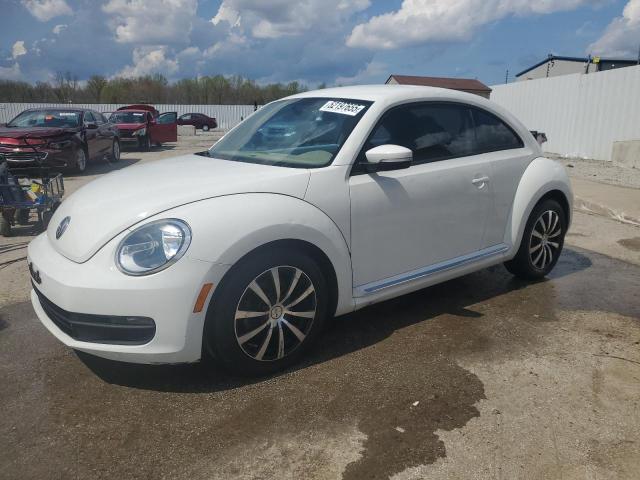 VOLKSWAGEN BEETLE 2013 with VIN 3VWJP7ATXDM662072 - Photo from auction