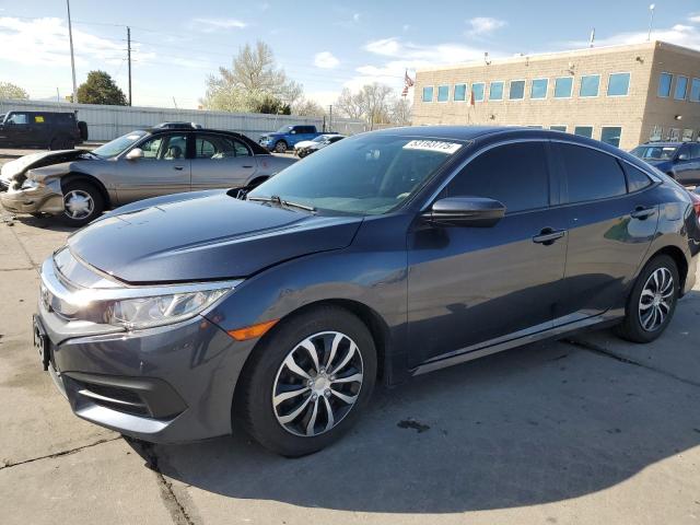 HONDA CIVIC LX 2018 with VIN 2HGFC2F59JH606783 - Photo from auction