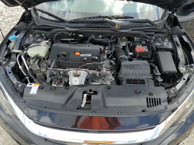 Photo 11 from auction – 2018 HONDA CIVIC LX with VIN 19XFC2F59JE036987