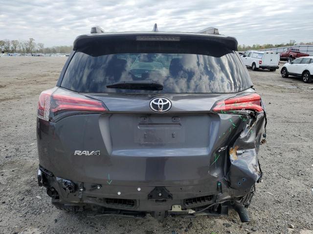 Photo 6 from auction – 2018 TOYOTA RAV4 with VIN JTMWFREV0JJ188631