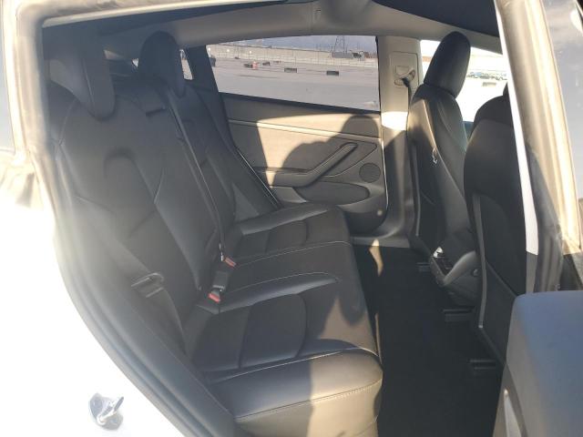 Photo 11 from auction – 2022 TESLA MODEL 3 with VIN 5YJ3E1EB2NF201275
