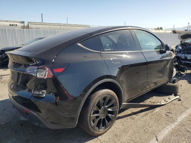 Снимка 3 от търг – 2023 TESLA MODEL Y с VIN 7SAYGDEE8PA025847