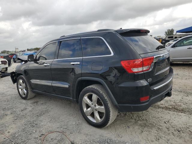 Photo 2 from auction – 2013 JEEP GRAND CHER with VIN 1C4RJECG9DC561618