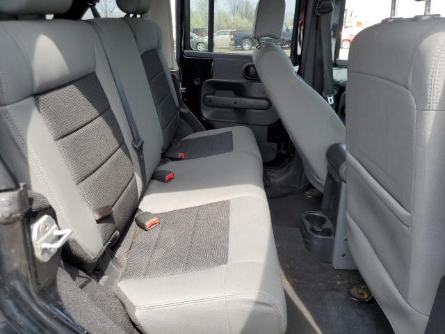 Photo 11 from auction – 2010 JEEP WRANGLER U with VIN 1J4BA5H19AL207139