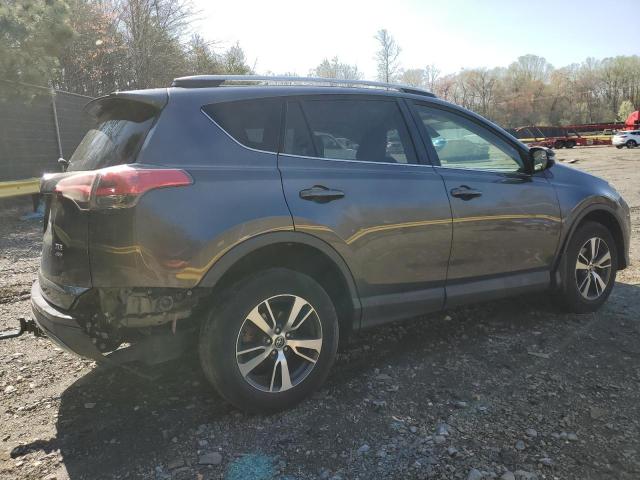 Photo 3 from auction – 2017 TOYOTA RAV4 XLE with VIN JTMRFREV0HJ109577