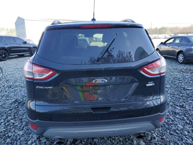 Photo 6 from auction – 2016 FORD ESCAPE SE with VIN 1FMCU9GX4GUC04677