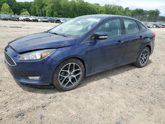 FORD FOCUS SEL 2017 with VIN 1FADP3H26HL229142 - Photo from auction