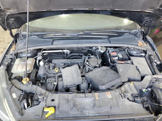 Photo 11 from auction – 2016 FORD FOCUS SE with VIN 1FADP3K23GL311370