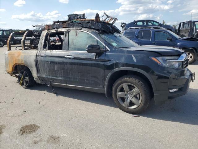 Photo 4 from auction – 2023 HONDA RIDGELINE with VIN 5FPYK3F74PB044766