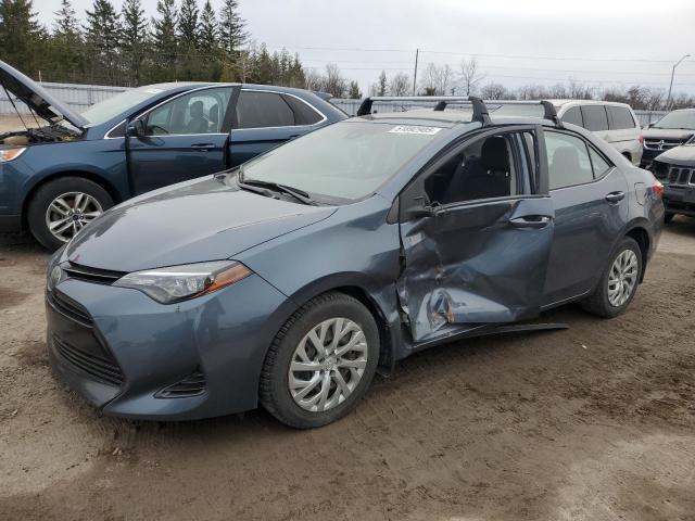 TOYOTA COROLLA L 2017 with VIN 2T1BURHE1HC958907 - Photo from auction