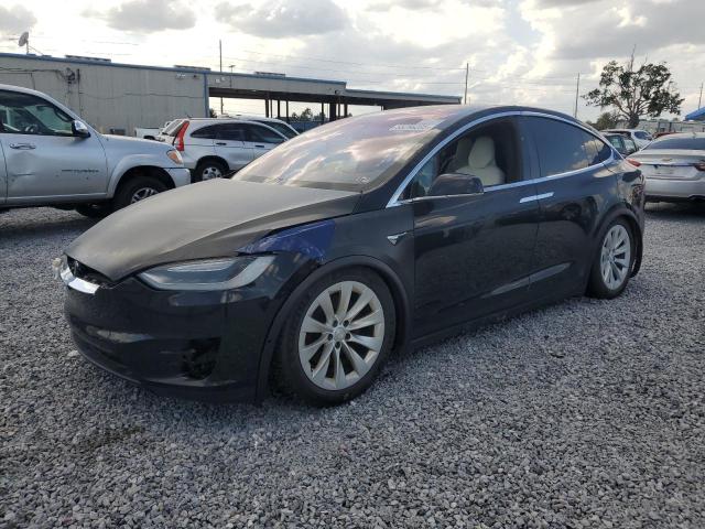 TESLA MODEL X 2017 with VIN 5YJXCBE2XHF060912 - Photo from auction