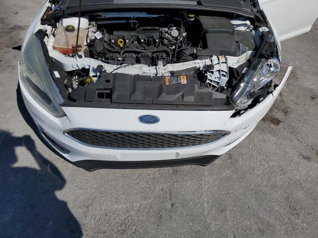 Photo 11 from auction – 2016 FORD FOCUS SE with VIN 1FADP3K23GL381922