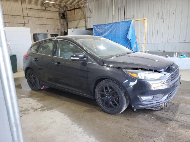 Photo 4 from auction – 2016 FORD FOCUS SE with VIN 1FADP3K23GL311370