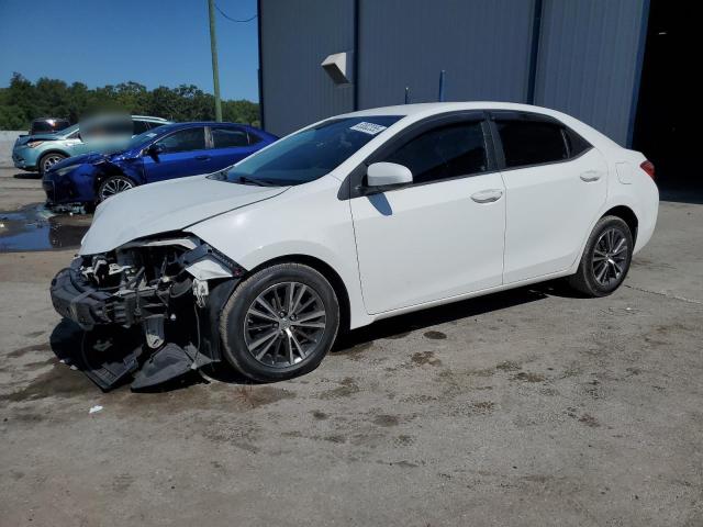 TOYOTA COROLLA L 2017 with VIN 5YFBURHE1HP630029 - Photo from auction