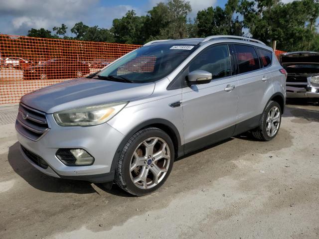 FORD ESCAPE TIT 2017 with VIN 1FMCU0J98HUB19798 - Photo from auction