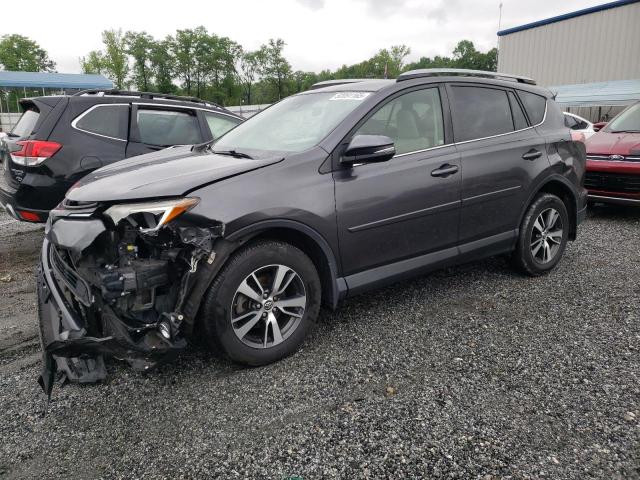 TOYOTA RAV4 XLE 2017 with VIN JTMRFREV0HJ130977 - Photo from auction