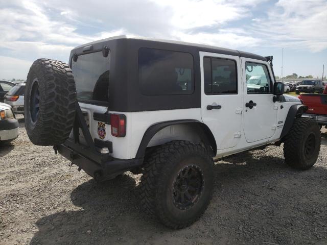 Photo 3 from auction – 2012 JEEP WRANGLER U with VIN 1C4BJWDG5CL172074