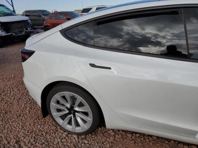 Photo 10 from auction – 2022 TESLA MODEL 3 with VIN 5YJ3E1EA1NF299075