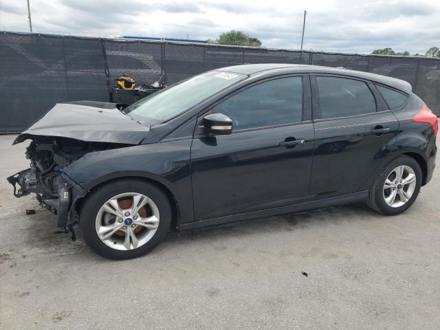 FORD FOCUS SE 2014 with VIN 1FADP3K27EL180425 - Photo from auction