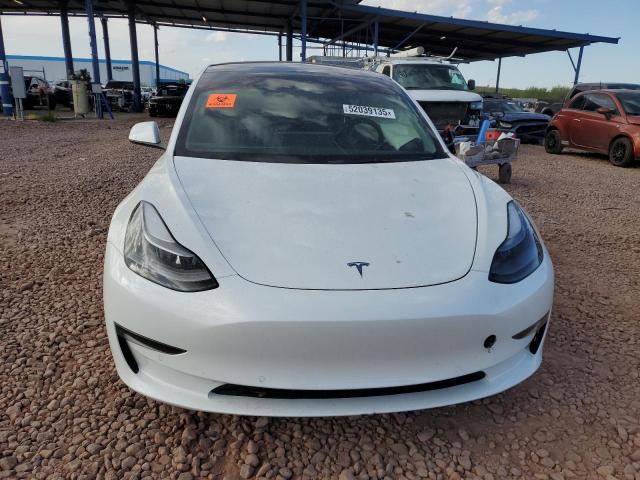 Photo 5 from auction – 2022 TESLA MODEL 3 with VIN 5YJ3E1EA1NF299075