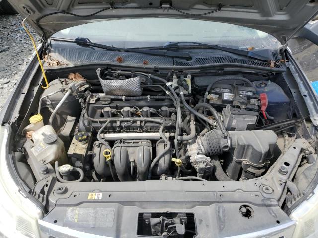 Photo 11 from auction – 2009 FORD FOCUS S with VIN 1FAHP34N99W257714