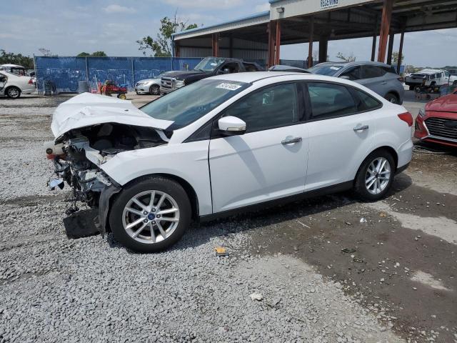 FORD FOCUS SE 2016 with VIN 1FADP3F24GL228749 - Photo from auction