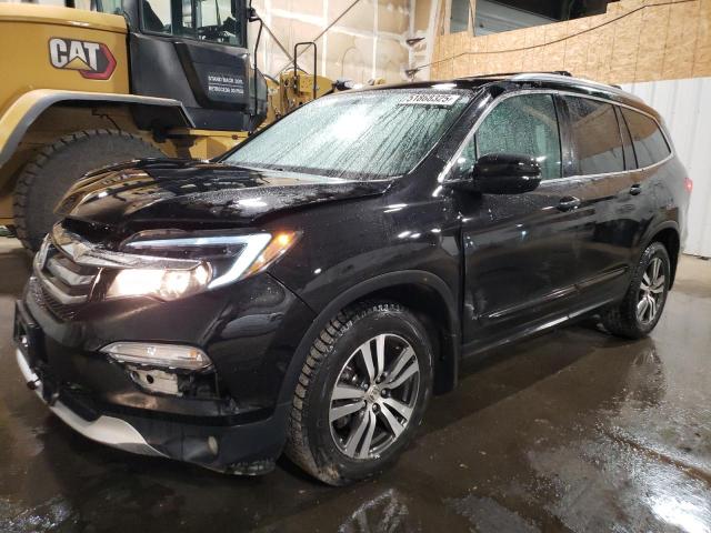 HONDA PILOT EXL 2016 with VIN 5FNYF6H58GB011621 - Photo from auction