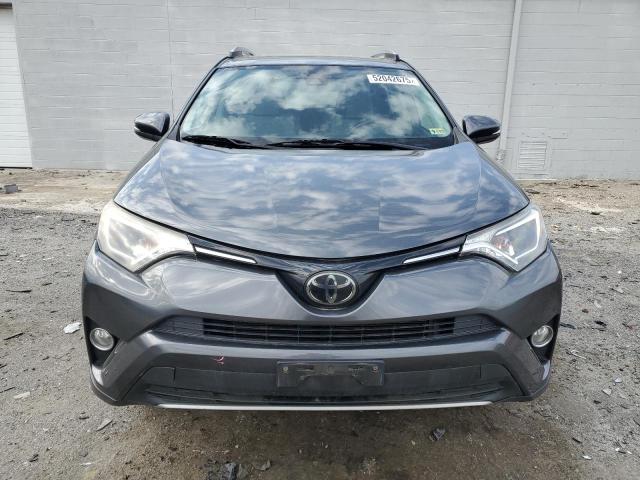 Photo 5 from auction – 2018 TOYOTA RAV4 with VIN JTMWFREV0JJ188631