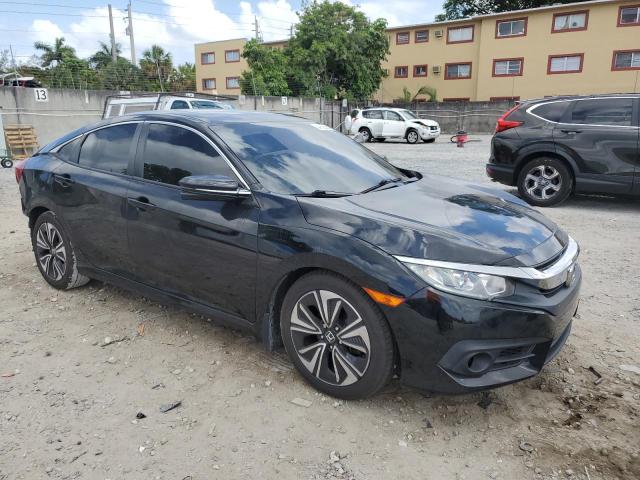 Photo 4 from auction – 2016 HONDA CIVIC EXL with VIN 2HGFC1F77GH660166