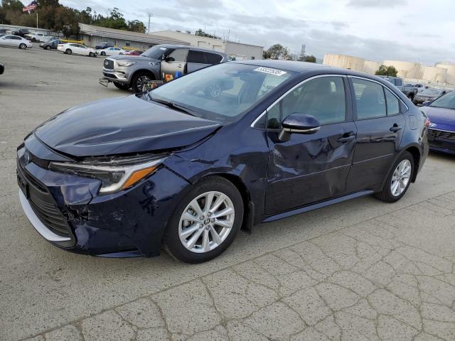 TOYOTA COROLLA LE 2025 with VIN JTDBCMFE5S3071965 - Photo from auction