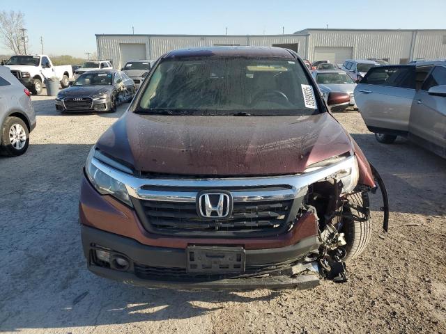 Photo 5 from auction – 2019 HONDA RIDGELINE with VIN 5FPYK3F50KB017426