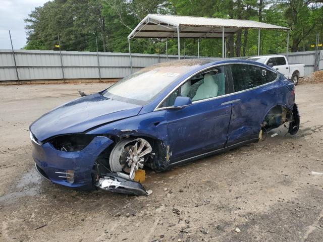 TESLA MODEL X 2020 with VIN 5YJXCDE22LF303617 - Photo from auction