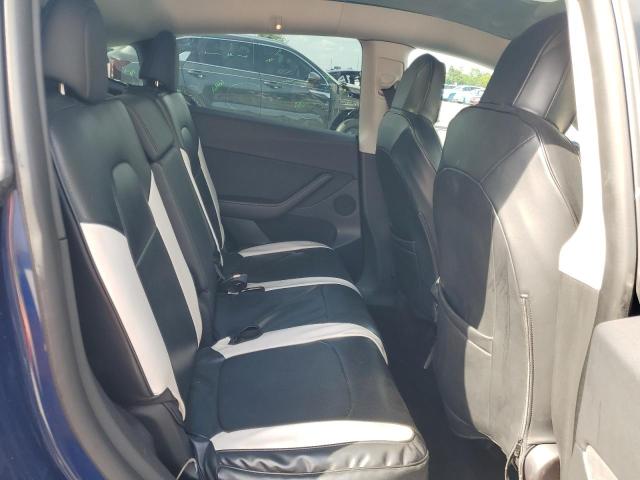 Photo 11 from auction – 2022 TESLA MODEL Y with VIN 7SAYGAEE2NF390507