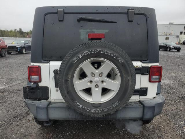 Снимка 6 от търг – 2016 JEEP WRANGLER U с VIN 1C4BJWDG1GL239596