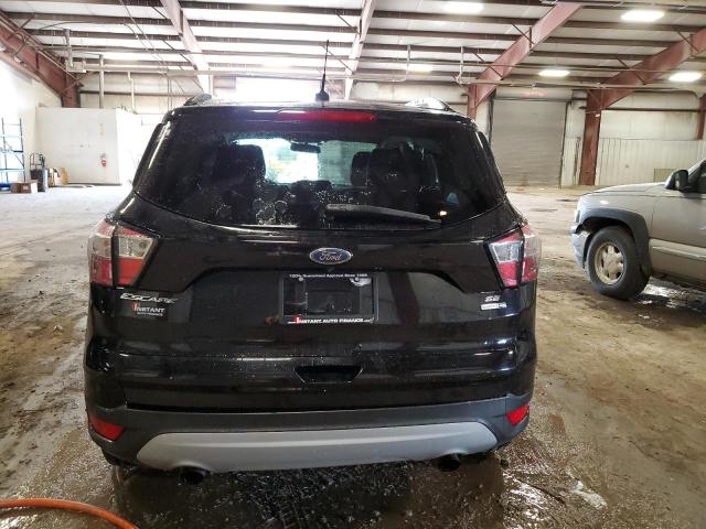 Photo 6 from auction – 2018 FORD ESCAPE SE with VIN 1FMCU9GDXJUB75957