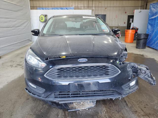 Photo 5 from auction – 2016 FORD FOCUS SE with VIN 1FADP3K23GL311370