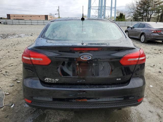 Photo 6 from auction – 2016 FORD FOCUS SE with VIN 1FADP3F21GL334852