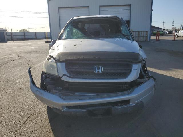 Photo 5 from auction – 2004 HONDA PILOT EX with VIN 2HKYF18424H549822