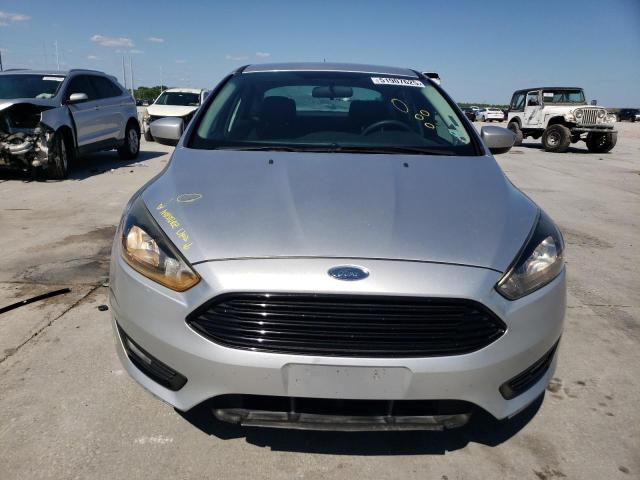 Снимка 5 от търг – 2018 FORD FOCUS SE с VIN 1FADP3F20JL291404
